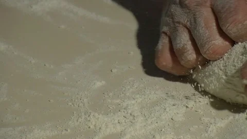 Making pizza or pide dough by close up male hands in pastry kitchen.  Stock Footage 90689629