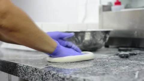 Making pizza from piece of dough Stock Footage 143666329