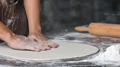 Making pizza the process ,Making dough by male hands,pizza prepare dough Stock Footage 149577715