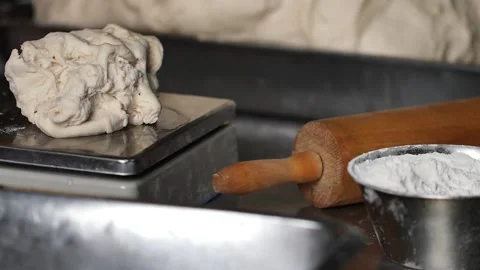 Making pizza the process ,Making dough by male hands,pizza prepare dough Stock Footage 149577916