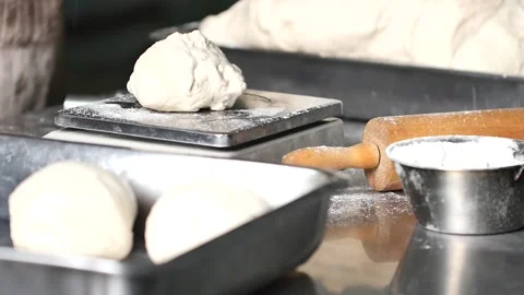Making pizza the process ,Making dough by male hands,pizza prepare dough Stock Footage 149577923