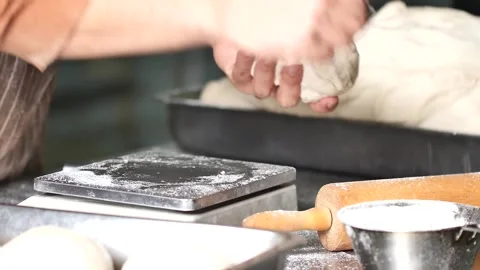 Making pizza the process ,Making dough by male hands,pizza prepare dough Stock Footage 149577983