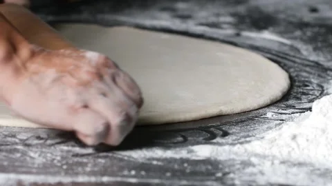 Making pizza the process ,Making dough by male hands,pizza prepare dough Stock Footage 149577989