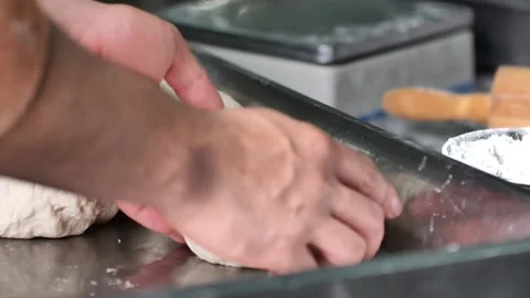 Making pizza the process ,Making dough by male hands,pizza prepare dough Stock Footage 149577990