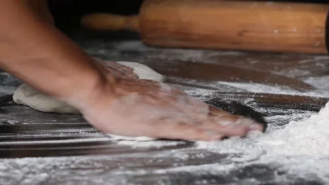 Making pizza the process ,Making dough by male hands,pizza prepare dough by hand Stock Footage 149577992