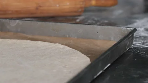 Making pizza the process ,Making dough by male hands,pizza prepare dough Stock Footage 149577996