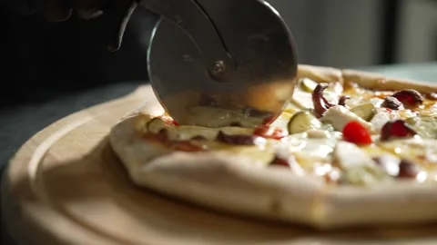 Making Pizza in Restaurant Kitchen Stock Footage 328952741