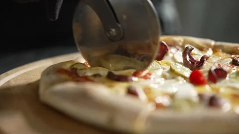 Making Pizza in Restaurant Kitchen Stock Footage 328952745