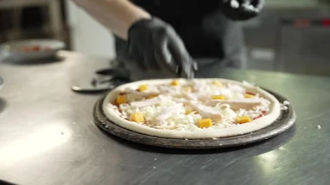 Making Pizza in Restaurant Kitchen Stock Footage 328952760