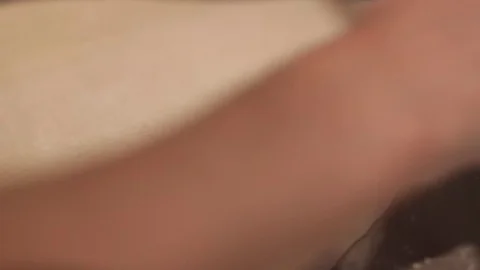 Making a Pizza - Rolling the Dough Stock Footage 77225600