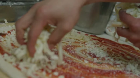 Making pizza spreading mozzarella cheese italian restaurant kitchen Video stock 238793876