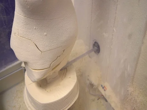 Making a plaster cast with the help of Carver-Robot Stock Footage 73437825