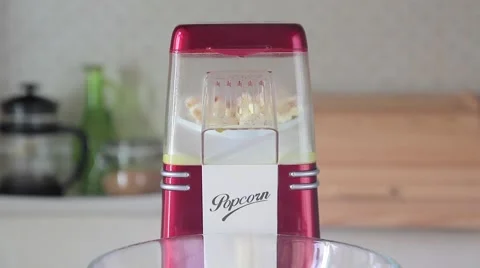 Making popcorn on a kitchen at home Stock Footage 68537030