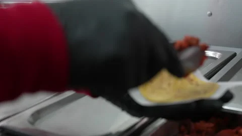 Making pork tacos on a soft shell corn tortilla - food truck series Stock Footage 234294480