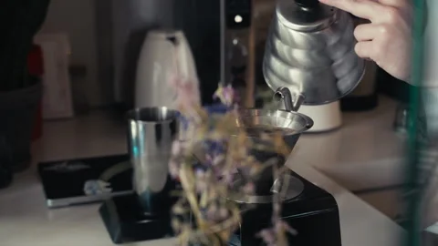 Making a pour over coffee in a coffee shop Stock Footage 244542688