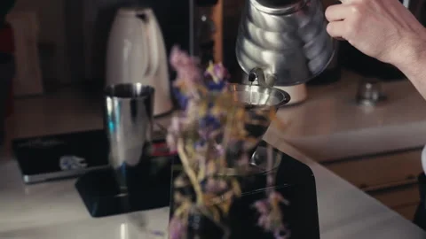 Making a pour over coffee in a coffee shop Stock Footage 244542839