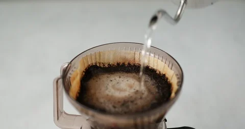 Making pour over coffee with dripper Stock Footage 119424816
