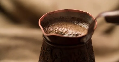 Making preparing Coffee in cezve close up shot slow motion 4K video Stock Footage 98251193