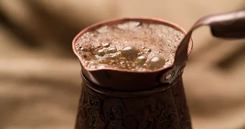 Making preparing Coffee in cezve close up shot timelapse video Stock Footage 98265994