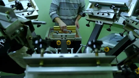 Making a Printing Pattern on a T-shirt in Production Video stock 169233107