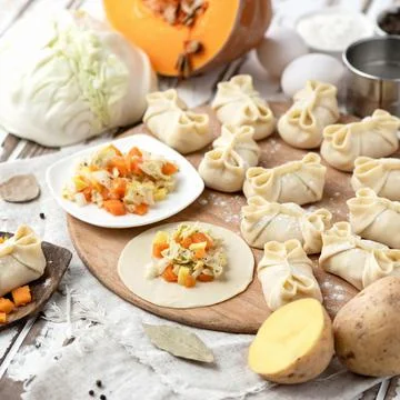 Making Process of dumplings with potatoes, pumpkin and cabbage. Vegetable Stock Photos