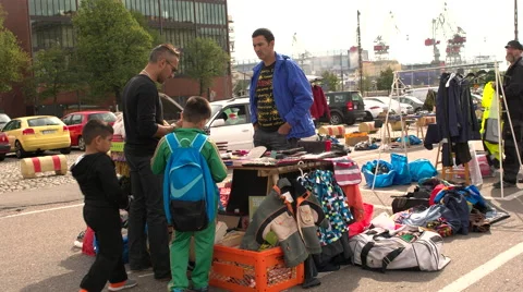 Making a purchase at a flea market Stock Footage 54656360