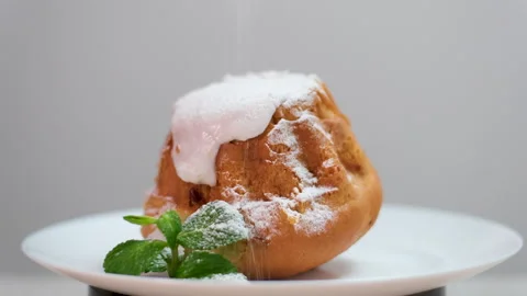 Making Raspberry Cake With Cream. sprinkle with powdered sugar baking Stock Footage 302600677