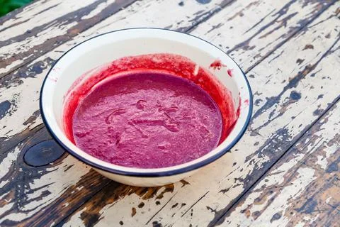 Making a raspberry jam. Boil raspberry in the pan. Texture fruit, raspberry j Stock Photos