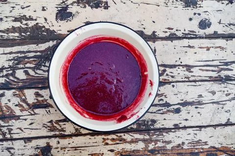 Making a raspberry jam. Boil raspberry in the pan. Texture fruit, raspberry j Stock Photos