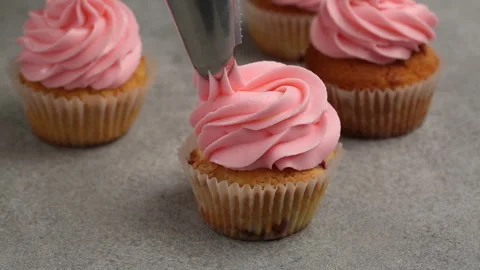 Making raspberry muffins with frosting and fresh berries, recipe process video Stock Footage 242607811