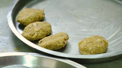 Making Raw Koftas for the vegetable Kofta curry an Indian Food, 4k footage , Clo Stock Footage 248490985
