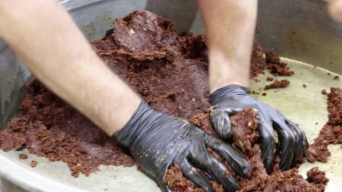 Making raw meatballs ( Turkish: Cig Kofte ) Stock Footage 208324070