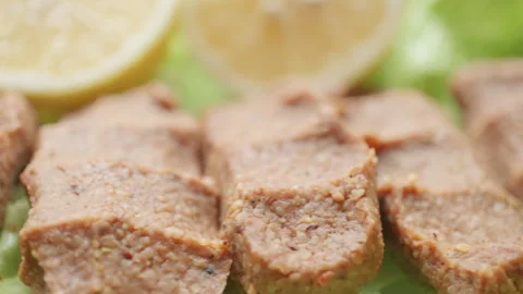 Making raw meatballs ( Turkish: Cig Kofte ) on wooden background Stock Footage 295192596