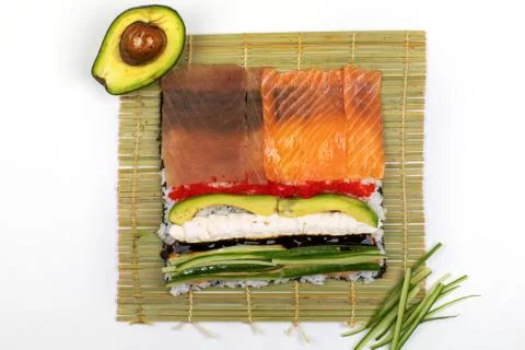 Making Rolled Sushi in a bamboo Sushi Mat Stock Photos