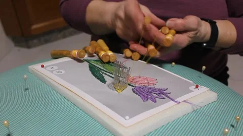 Making a rose with bobbin lace Stock Footage 304832150