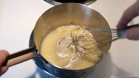 Making roux with flour and butter Stock Footage 219518508