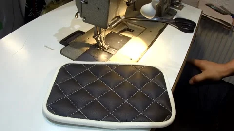 Making a rug for the car, handmade, appearance of a leather rug and an old Video stock 316588722