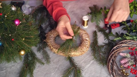 Making rustic christmas wreath. Selected focus Stock Footage 165994902