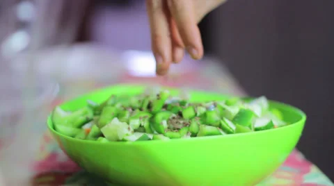 Making salad - adding flax seed, olive oil, shoyo Stock Footage 35223473