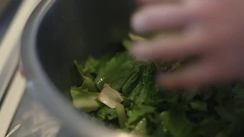 Making a Salad - Adding Salad Leaves Stock Footage 77225812