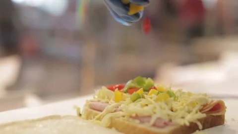 Making A Sandwich - Adding Peppers Stock Footage 77225792