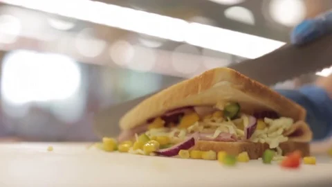 Making a Sandwich - Slicing Triangles Stock Footage 77225757