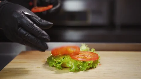 Making a sandwich with vegetables Stock Footage 129685092