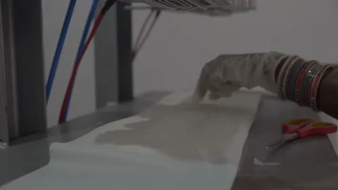 Making Sanitary Napkin with Semi automatic Machine in smalll factory in india Stock Footage 221115239