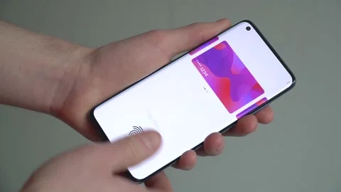 Making a secure online payment using a smartphone with a fingerprint scanner 動画素材 151894169