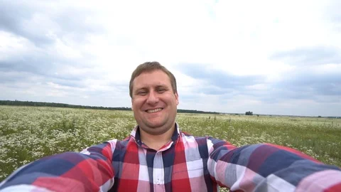 Making selfie, young man taking a selfie outdoors Stock Footage 92047772