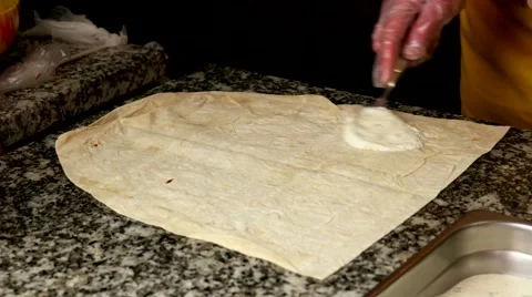 Making a shawarma or doner kebab with chicken meat and vegetables Stock Footage 59185748