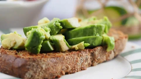 Making a simple avocado toast at home Stock Footage 343653440