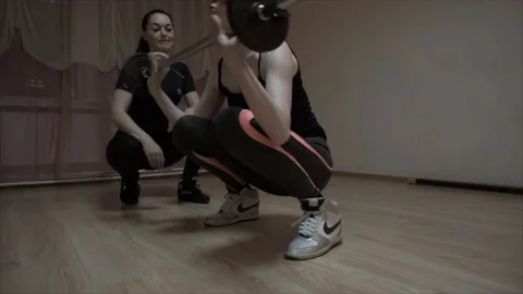 Making sit-ups with weight Stock Footage 87825225