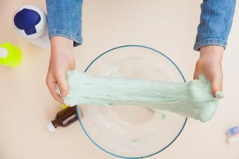Making slime, step by step instruction, final step seven the toy is ready. Stockfoto's